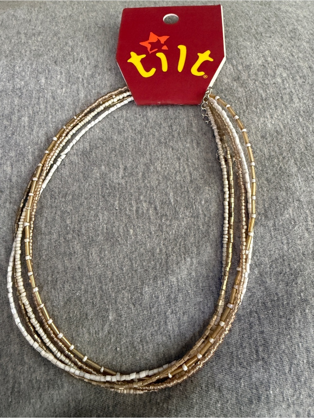 TILT Multi-Strand Beaded Necklace in Gold and White